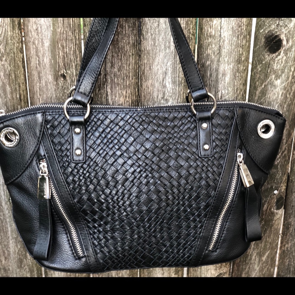 Excellent condition B.Makowsky black leather !